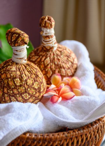 thai-massage-with-herbal-hot-compress-ball_49071-1741